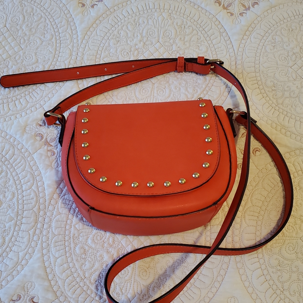 Small Satchel bag orange with leopard print lining. Great condition.  9" x 8"